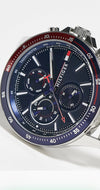 Tommy Hilfiger men's silver watch with red and navy dial